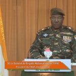 Image obtained by AFP from ORTN - Télé Sahel, on 19 August 2023, of General Abdourahamane Tiani reading a statement on national television.