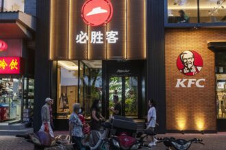 Yum China says tech let it open stores without needing more staff