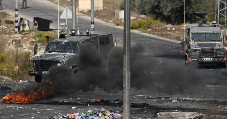 13 Palestinians and an Israeli Officer Killed as Violence Surges in West Bank