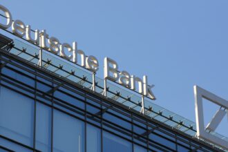Deutsche Bank net profit slides 8% in third quarter but beats expectations