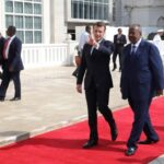 French President Emmanuel Macron and Djibouti President Ismail Omar Guelleh during the official military welcome ceremony at the presidential palace in Djibouti on 12 March 2019.