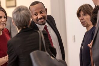 German Federal Minister for Foreign Affairs Annalena Baerbock (L), Ethiopian Prime Minister Abiy Ahmed (C), and French Minister of European and Foreign Affairs Catherine Colonna (3rd R), in Addis Ababa, Ethiopia, on 12 January 2023.