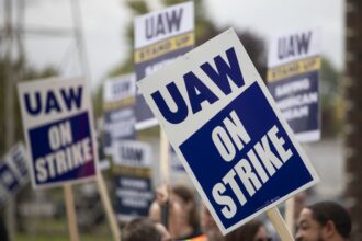 GM's stock falls amid strikes, potential air bag recall