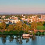 Drone Shot Looking Over Willamette River and Riverfront City Park Towards Downtown Salem, OR