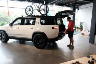 Rivian shares sink after EV maker announces $1.5 billion raise