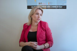 Russian Journalist Sentenced in Absentia for Antiwar Protest