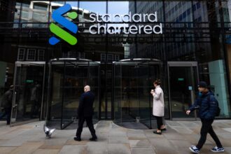 Standard Chartered shares slide 12% as China losses hit earnings