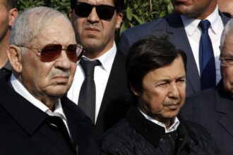 Said Bouteflika (C) with Gaid Salah (L) at General Mohamed Atailia