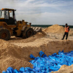 More Than 100 Bodies Are Delivered to a Mass Grave in Southern Gaza