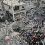 Rescuers Search Rubble for Victims in Jabaliya