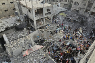 Rescuers Search Rubble for Victims in Jabaliya