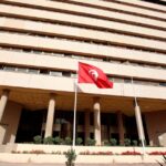 A man walks out of the Central Bank in Tunis, Tunisia, on 27 April 2016.