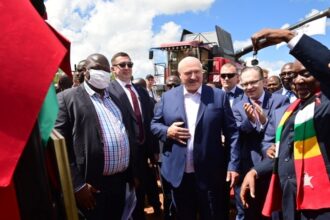 Belarusian President Alexander Lukashenko and his Zimbabwean counterpart Emmerson Mnangagwa at a ceremony to hand over Belarusian agricultural machinery in Harare on 31 January 2023.