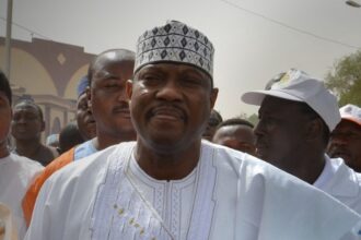 Hama Amadou takes part in a march in Niamey on 15 June 2014.