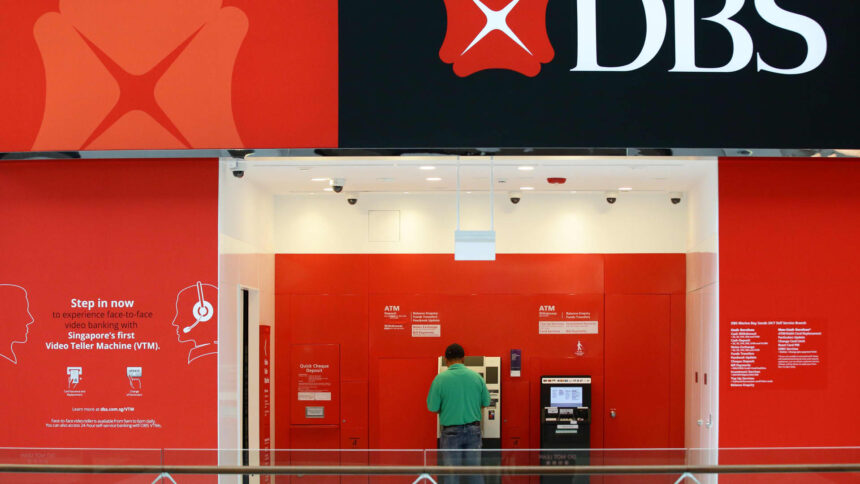 DBS cuts executive pay on banking outages; posts record earnings in 2023