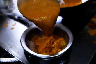 Who Created Butter Chicken? India’s Great Curry Clash.