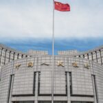 China's PBOC governor says there's room to cut banks' RRR