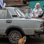 In Occupied Ukraine, Casting a Vote (for Putin) as Armed Soldiers Watch